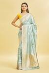 Buy_Mint N Oranges_Blue Silk Zari Round Neck Floral Pattern Saree With Blouse Piece_at_Aza_Fashions