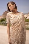 Shop COUTURE BY NIHARIKA Beige Organza Sequins, Beads Round Neck Floral Embroidered Saree With Blouse Online at Aza Fashions Shop_COUTURE BY NIHARIKA_Beige Organza Sequins, Beads Round Neck Floral Embroidered Saree With Blouse _Online_at_Aza_Fashions