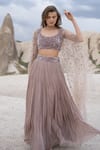 COUTURE BY NIHARIKA_Purple Viscose, Net Sequins Scoop Neck Floral Embroidered Cape And Lehenga Set _at_Aza_Fashions
