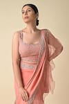 Kavita D_Peach Silk Georgette Embroidered Sequin U Neck Pre-draped Frill Saree  _Online_at_Aza_Fashions