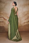 Shop Label Varsha Green Viscose, Velvet Boat Neck Stripe Woven Saree With Blouse at Aza Fashions Shop_Label Varsha_Green Viscose, Velvet Boat Neck Stripe Woven Saree With Blouse_at_Aza_Fashions