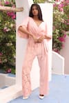 Buy_COUCHÉ BY ANANDINI_Pink Cotton, Lycra, Lace Embroidery V-neck Placement Draped Jumpsuit _at_Aza_Fashions