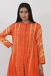 Shop_Krishna Mehta_Orange Modal High Round Tie-dye Pattern Asymmetric Tunic _at_Aza_Fashions