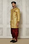 Shop_Aryavir Malhotra_Gold Sherwani Jamewar Woven Brocade Floral Pattern With Dhoti Pant _Online_at_Aza_Fashions