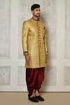 Aryavir Malhotra_Gold Sherwani Jamewar Woven Brocade Floral Pattern With Dhoti Pant _at_Aza_Fashions