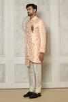 Aryavir Malhotra_Peach Sherwani Jaquard Woven Floral Bloom Pattern With Churidar _at_Aza_Fashions