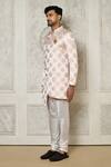 Aryavir Malhotra_Gold Sherwani Jaquard Woven Floral Butti Pattern With Churidar _at_Aza_Fashions