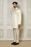 Aryavir Malhotra_Off White Tuxedo Satin Woven Swirl Ornate Pattern Sherwani With Churidar _at_Aza_Fashions