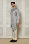 Aryavir Malhotra_Grey Jaquared Woven Floral Jaal Sherwani With Churidar _at_Aza_Fashions