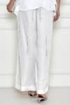 Shop_DILNAZ_White Satin Linen Embroidery Diamante Placement Trouser  _at_Aza_Fashions