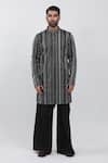 Buy_Krishna Mehta_Black Cotton, Viscose Embroidery Textured Stripe Kurta Set _at_Aza_Fashions