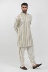 Buy_Krishna Mehta_Off White Cotton Viscose Embroidery Stripe Textured Pattern Kurta Set _at_Aza_Fashions