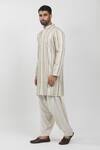 Krishna Mehta_Off White Cotton Viscose Embroidery Stripe Textured Pattern Kurta Set _at_Aza_Fashions