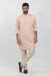 Buy_Krishna Mehta_Peach Cotton, Viscose Mandarin Collar Textured Kurta Set _at_Aza_Fashions