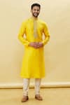 Shop_Samyukta Singhania_Yellow Silk Plain Floral Solid Kurta With Churidar Set _Online_at_Aza_Fashions