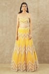 Keerthi Kadire_Yellow Net Hand Embroidered Pearl Sweetheart Neck Blouse Bridal Lehenga Set _at_Aza_Fashions