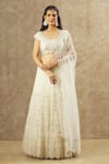 Buy_Keerthi Kadire_Off White Net Hand Embroidered Pearl Round Work Blouse Bridal Lehenga Set _at_Aza_Fashions