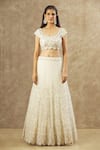 Keerthi Kadire_Off White Net Hand Embroidered Pearl Round Work Blouse Bridal Lehenga Set _at_Aza_Fashions