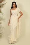 Buy_Priyanka Jain_Ivory Silk Woven Sequins Square Neck Ruffle Pre-draped Saree With Blouse _at_Aza_Fashions