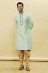 Buy_Samyukta Singhania_Green Silk, Leather Embroidery Mandarin Collar Kurta Patiala Set _Online_at_Aza_Fashions