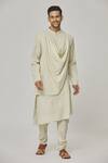 Buy_Aham-Vayam_Cream Cotton Tatvam Mahotsav Draped Kurta And Pyjama Set _at_Aza_Fashions