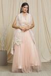 Buy Divya Kanakia Peach Net Pearls Round Neck Embellished Lehenga Set at Aza Fashions Buy_Divya Kanakia_Peach Net Pearls Round Neck Embellished Lehenga Set _at_Aza_Fashions