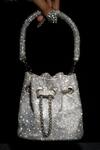 Buy_Ozel_Silver Embellished Hotflix Rhinestone Studded Bucket Bag_at_Aza_Fashions