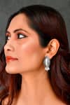 Ishhaara_Silver Plated Fish Shaped Oxidised Carved Earrings_Online_at_Aza_Fashions