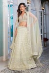 Buy_Jiya by Veer Design Studio_Gold Tissue Embroidery Mirror V Neck Chevron Lehenga Set _at_Aza_Fashions