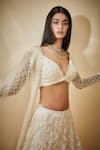 Shop_Premya By Manishii_White Tulle Hand Embroidered Beads V Neck Blouse Bridal Lehenga Set _Online_at_Aza_Fashions