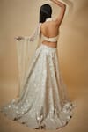 Shop_Premya By Manishii_White Tulle Hand Embroidered Sequins Halter Blouse Lehenga Set _at_Aza_Fashions