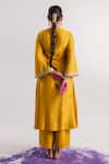 Shop_Tussah By Siddhi Shah_Yellow Slub Silk Hand Embroidered Sequins Sleeve Hem Kurta And Pant Set  _at_Aza_Fashions