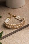 Shop_Curio Cottage_Gold Plated Kundan And Pearls & Studded Ponchi Bracelet_at_Aza_Fashions