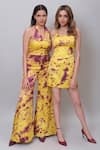 Nayantaara_Yellow Bamberg Satin Tie Dye Abstract Pattern Halter Collar Flared Jumpsuit _Online_at_Aza_Fashions