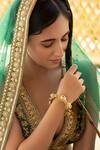 Buy_Curio Cottage_Gold Plated Kundan, Pearls And Ghungroo Drop Bangles_at_Aza_Fashions
