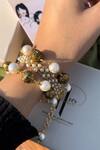 Buy_Heer-House Of Jewellery_Gold Plated Shell Pearl And Beads Embellished Suvarna Bracelet_at_Aza_Fashions