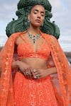 Shop_Seema Gujral_Orange Net Sequins V-neck Neon Abstract Pattern Embroidered Bridal Lehenga Set_Online_at_Aza_Fashions