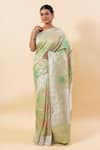 Buy_TaBa Kashi By Artika Shah_Green Tussar Silk Woven Floral Jaal Resham Saree With Running Blouse  _at_Aza_Fashions