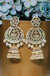 Shop_Ishhaara_Gold Plated Pearls, Stones Oval Shaped Jhumkas _at_Aza_Fashions