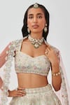 Aisha Rao_Ivory Tissue Applique Mahnaz Mirror Work 16 Kali Bridal Lehenga Set  _at_Aza_Fashions