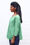 Shop Dhi Green Cotton Boat Neck High-low Organic Shirt at Aza Fashions Shop_Dhi_Green Cotton Boat Neck High-low Organic Shirt _at_Aza_Fashions