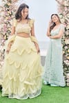 Sanjana Thakur_Yellow 100% Nylon Net Embroidered French Knots Ruffled Lehenga Blouse Set _at_Aza_Fashions