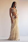 Buy_Arpita Mehta_Beige Saree Georgette Hand Embroidered Pre-draped Ruffle With Tasselled Blouse _at_Aza_Fashions