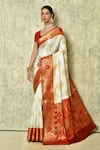 Buy_Samyukta Singhania_White Pure Banarasi Silk Woven Floral And Paisley Saree With Running Blouse _at_Aza_Fashions