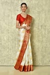 Buy_Samyukta Singhania_White Pure Banarasi Silk Woven Floral And Paisley Saree With Running Blouse _Online_at_Aza_Fashions