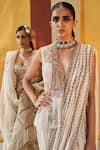 Shop_Priyanka Singh_Ivory Net Embroidery Zardozi Deep V Neck Pre-draped Saree With Top  _Online_at_Aza_Fashions