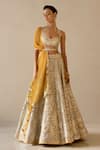 Buy_VARUN NIDHIKA_Beige Silk Organza And Indian Tulle Embroidery Hand Charkhi Bridal Lehenga Set _at_Aza_Fashions