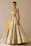 Buy_VARUN NIDHIKA_Beige Silk Organza And Indian Tulle Embroidery Hand Charkhi Bridal Lehenga Set _Online_at_Aza_Fashions