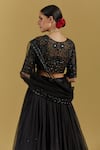 Ikshita Choudhary_Black Blouse And Dupatta Net Hand Embroidered Floral Patterns & Chita Skirt Set _at_Aza_Fashions