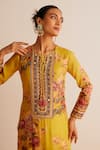 Shop_Kalista_Yellow Cotton, Silk Tassels, Mirrors Round Neck Floral Print Kurta Set _Online_at_Aza_Fashions